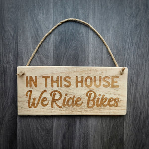In This House We Ride Bikes Wooden Sign