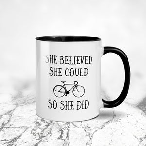 She Believed Cycling Mug White Black On Marble Top