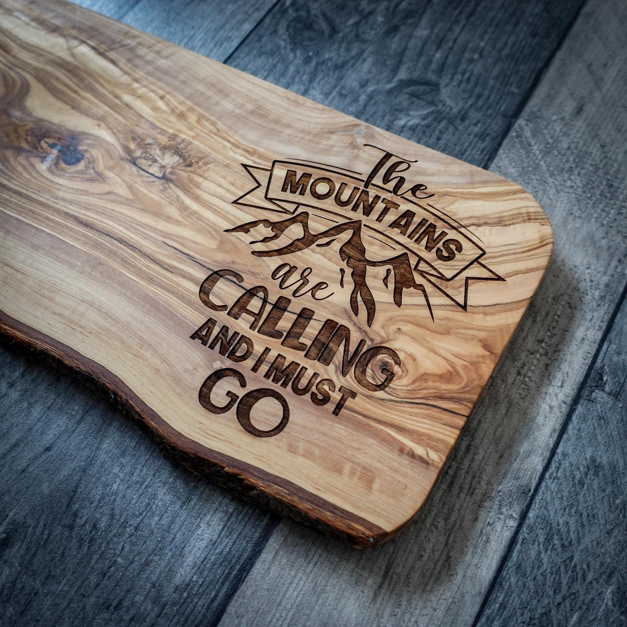 The Mountains Are Calling' Rustic Olive Wood Chopping Board - Sustainable & Stylish